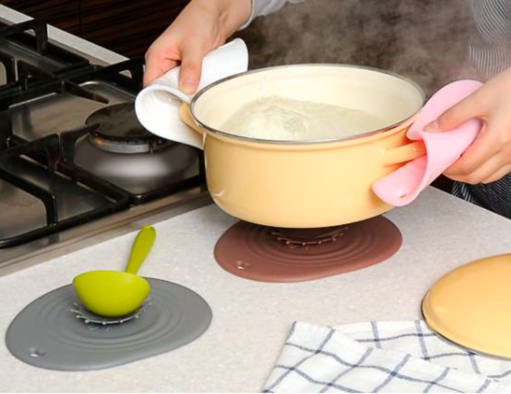Stick-It Silicone Trivet: The Ultimate Kitchen Companion with Unbeatable Stick-On Technology!